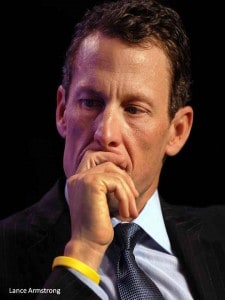 Lance Armstrong covering his mouth as though not wanting to let the truth out.